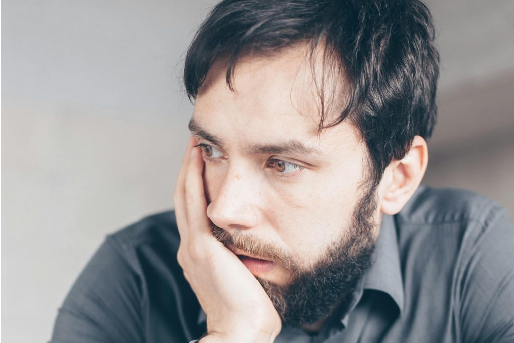 man worried by phishing scams